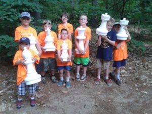 kids-with-chess-pieces
